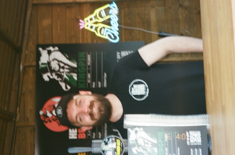 Team member with Kingpin poster at Taste of London